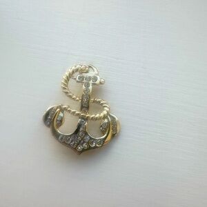 Gold tone anchor pin
